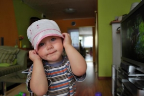 Něžný portrét - Dítě s kloboučkem