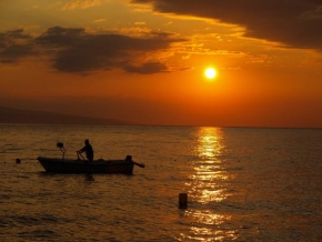 Tomáš Goldefus - Západ slunce s rybářem