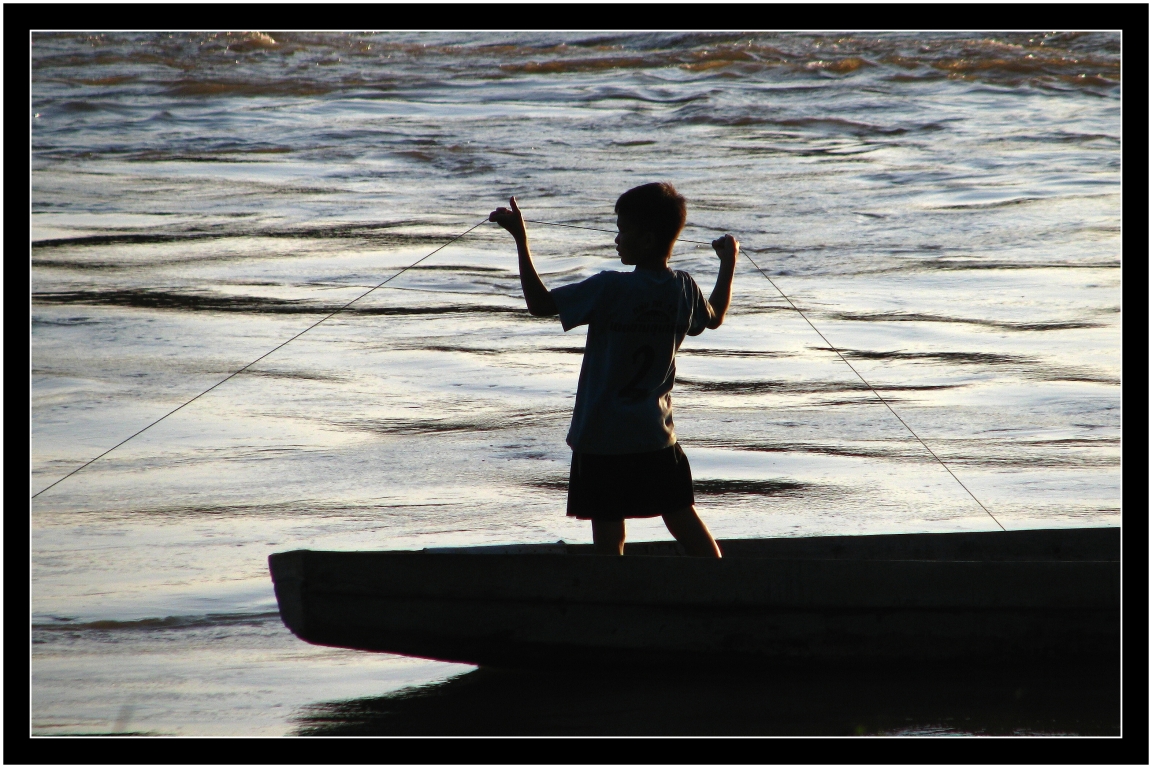 malý rybář na Mekongu