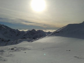 Zimní království - Východ slunce nad Alpami