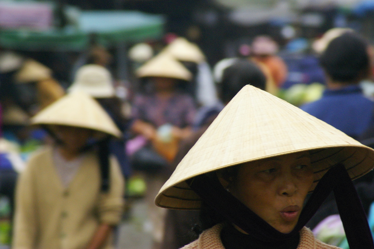 Vietnamské čepice na hlavnách vietnamských žen